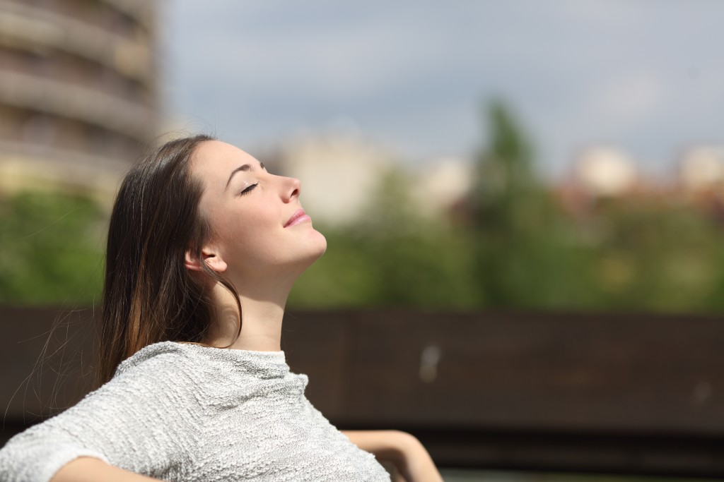 woman enjoing fresh air outside