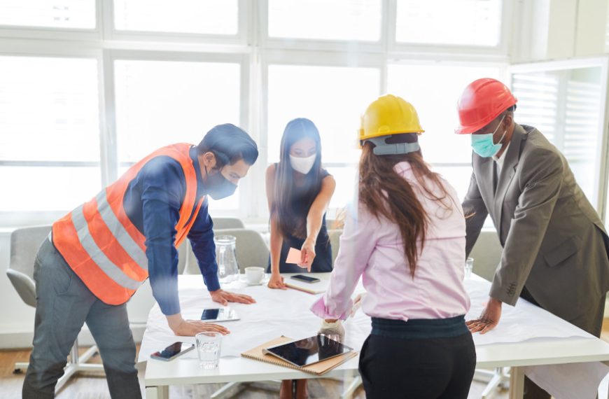 A group of engineers and architects discussing about a construction project